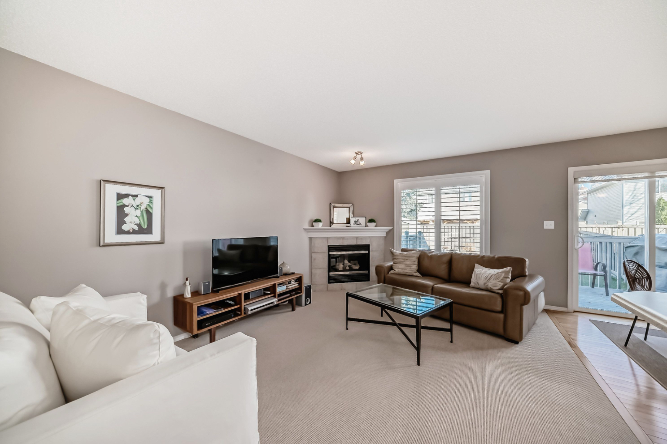 Open House. Open House Alert! Join us this Sunday from 1 to 3 pm to tour this bright, well-maintained duplex in MacEwan. Featuring 3 spacious bedrooms, a cozy fireplace, white kitchen with island, and a fenced yard—this home has it all! Located at the en